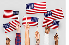Hands holding US Flags