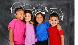 Group of happy young children who are at school